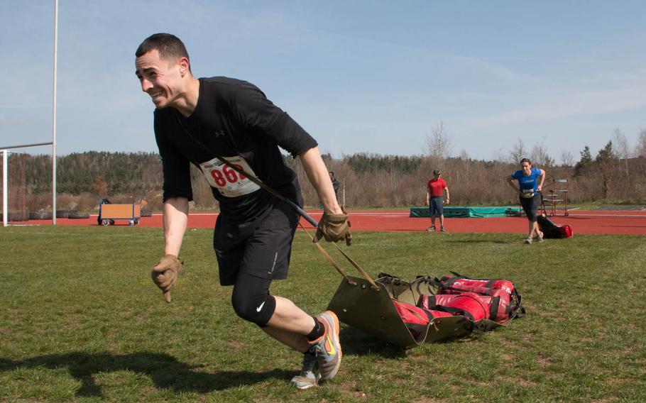 Obstacles, like this sled pull, dotted a 10-mile-long course that was the main event of the 4th annual Grafenwoehr rugged terrain obstacle run held Saturday, April 9, 2016 in Grafenwoehr, Germany.