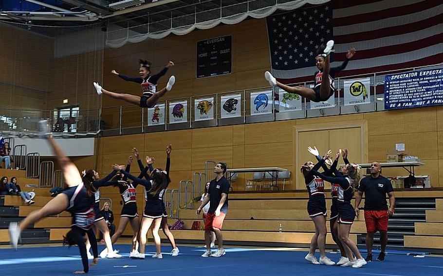 Members of the Aviano cheer squad perform some high-flying routines during the 2017 DODEA-Europe cheerleading competition on Saturday, Feb. 25, 2017, in Wiesbaden, Germany. Aviano took second place in the Division II category.