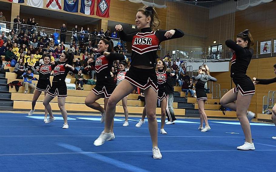 Cheerleaders from American Overseas School of Rome dance during the 2017 DODEA-Europe cheerleading competition on Saturday, Feb. 25, 2017, in Wiesbaden, Germany. AOSR took third place in the Division II category.