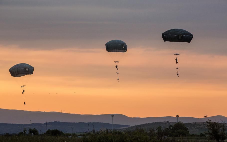 Soldiers of the 173rd Airborne Brigade, descends on Bezmer Airbase, Bulgaria, after jumping out of a C-17 aircraft during exercise Saber Guardian 17, on Tuesday, July 18, 2017. Eleven 173rd paratroopers were injured during a nighttime training jump near Turzii on Saturday.

Jada Owens/U.S. Army