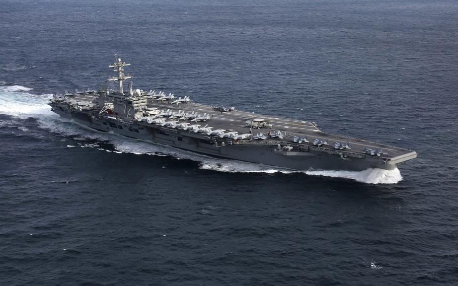 The aircraft carrier USS Abraham Lincoln plies  the Atlantic Ocean during a training exercise in January. The carries has  embarked on a deployment that is sending it to the U.S. 5th, 6th and 7th Fleet areas of responsibility.
