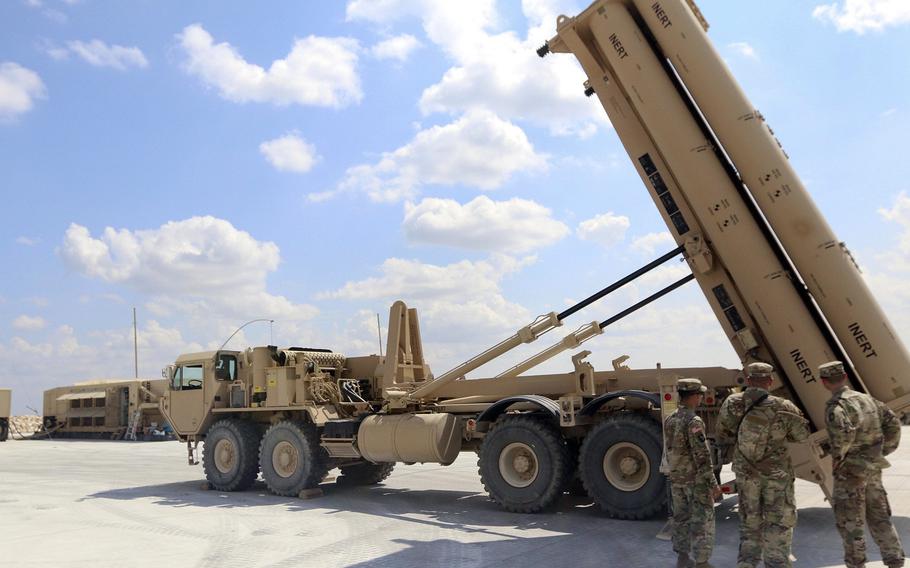 Soldiers with the 69th Air Defense Artillery Brigade look at a Terminal High Altitude Area Defense weapon system at Fort Hood, Texas. The unit will send a THAAD system to
Romania this summer.