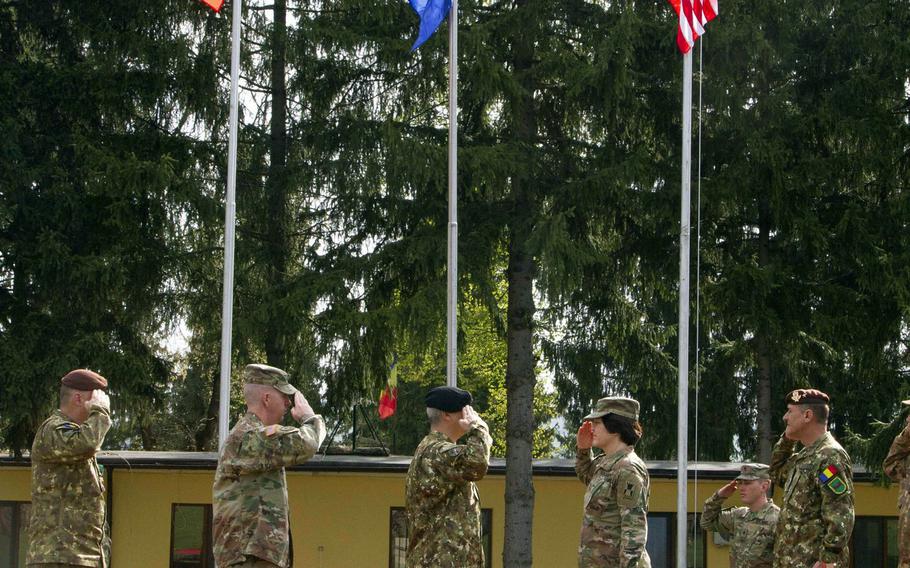 U.S. Army and Romanian leaders salute one another during the opening ceremony of Resolute Castle 2019 at Cincu Joint National Training Center, Romania, April 24, 2019. National Guard units from across the U.S. this week began the long process of building up Polish and Romanian training facilities in Cincu and the Drawsko Pomorskie and Zagan Training Areas in Poland as part of the exercise.