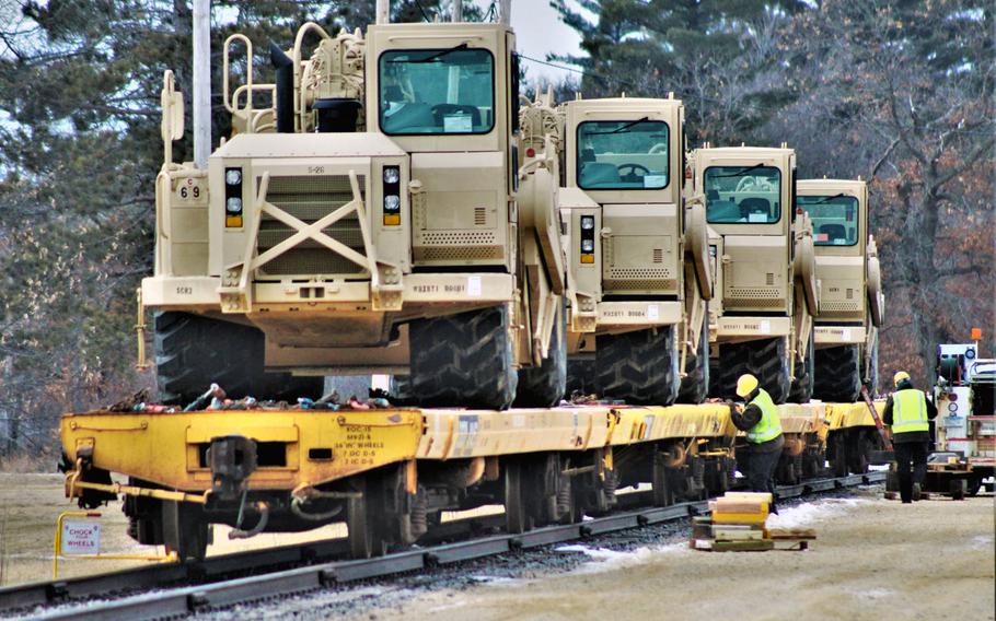 Military vehicles and equipment of the 389th Engineer Battalion is loaded on railcars Feb. 5, 2019, at the rail yard at Fort McCoy, Wis. The movement was for the 389th's future involvement in Operation Resolute Castle 2019 in Poland.