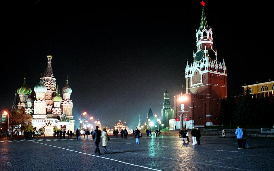 Moscow's Red Square, with St. Basil's Cathedral on the left and the Kremlin with the Spassky tower at right. The U.S. should pull a page from the Cold War playbook and drive Kremlin leaders to spend money in a tit-for-tat power game that its smaller economy cannot support, the Rand Corp. says in a new study.