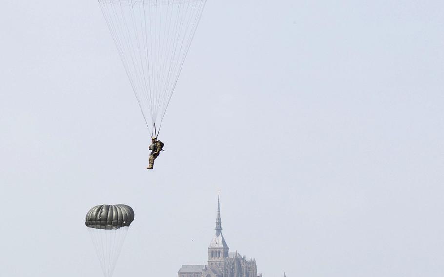 Soldiers assigned to the 10th Special Forces Group (Airborne) conduct an airborne operation near the island of Mont Saint Michel in France on Saturday, May 18, 2019.