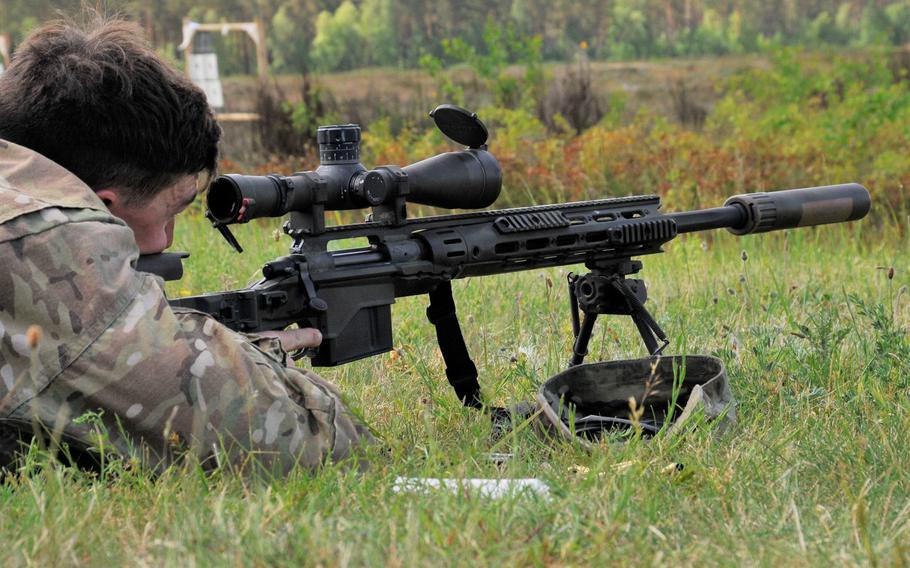 A U.S. soldier fires the M2010 Enhanced Sniper Rifle near the Bemowo Piskie training area, Poland, in June 2017. The same weapon was used by the 13-year-old son of a U.S. Army officer on a German military range nearly three years ago. The incident is now under investigation by German authorities.