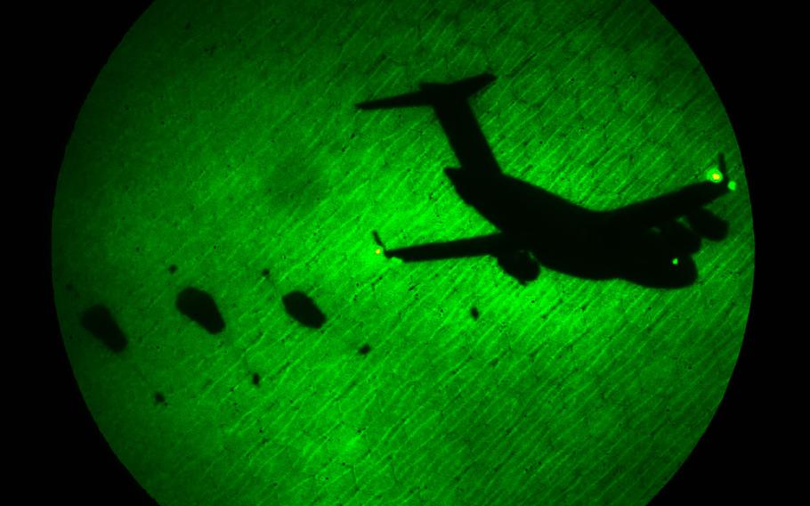 U.S. paratroopers from the 173rd Airborne Brigade and other allied paratroopers conduct night airborne operations from a C-17 Globemaster III during the Swift Response exercise at Boboc Drop Zone, Romania, June 14, 2019. A Canadian paratrooper was killed and two U.S. soldiers were injured Tuesday, June 18, during a Swift Response jump in Bulgaria.