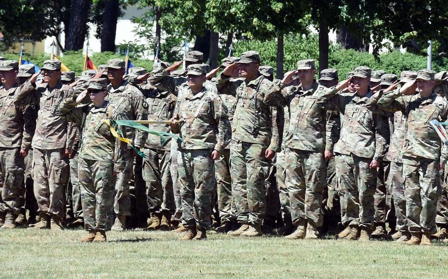 Soldiers at U.S. Army Garrison Bavaria salute during a ceremony rehearsal at Grafenwoehr, Germany, Thursday, June 27, 2019. The temperature was about 90 degrees at 3 p.m., according to a commonly used weather app. Soldiers in Germany were experiencing temperatures nearing 100 degrees on June 26.