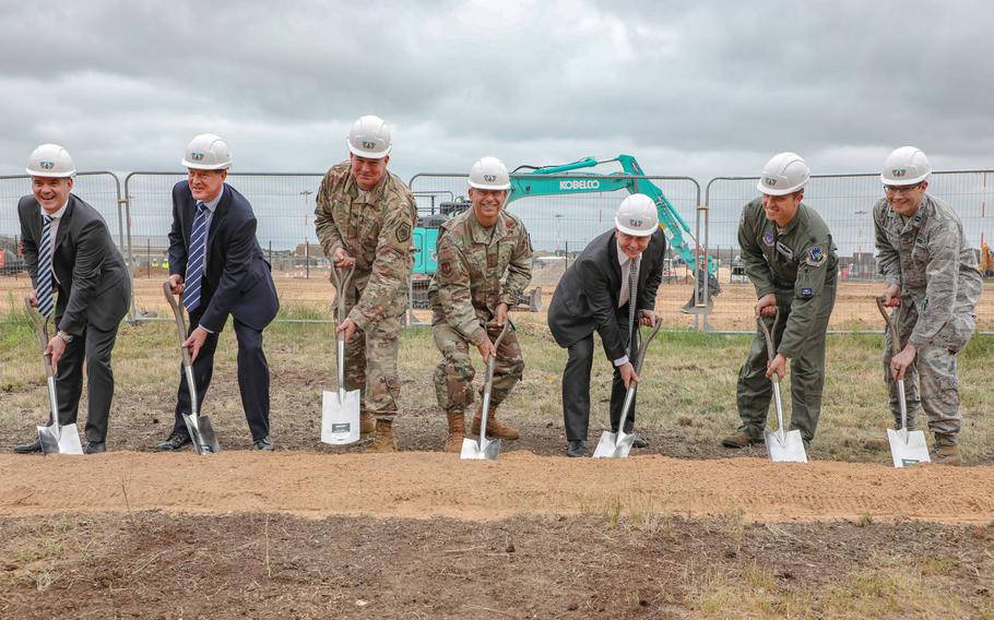 Dignitaries grab shovels Monday, July 15, 2019 during the new F-35 Lightning II facility groundbreaking ceremony on RAF Lakenheath. From left, James Hindes, managing director of aviation and defense for Kier Group; Chris Evans, managing director of the civil division for Volker Fitzpatrick; Col. William Marshall, 48th Fighter Wing commander; Gen. Jeffrey Harrigian, commander of U.S. Air Forces in Europe-Air Forces Africa and Allied Air Command; Keith Maddison, Defense Infrastructure Organization F-35 Program Manager; Lt. Col. Clinton Warner, director F-35 Program Integration Office; Capt. Robert Gilbert, chief of major programs, Program Management Office.