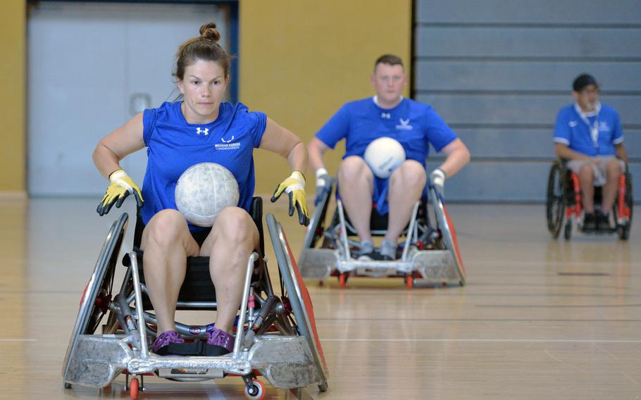 Wounded warriors go through wheelchair rugby practice drills at the Warrior Care event at Ramstein Air Base, Germany. The event, which is part of the Air Force Wounded Warrior program, is the first of its kind at an Air Force base in Europe.