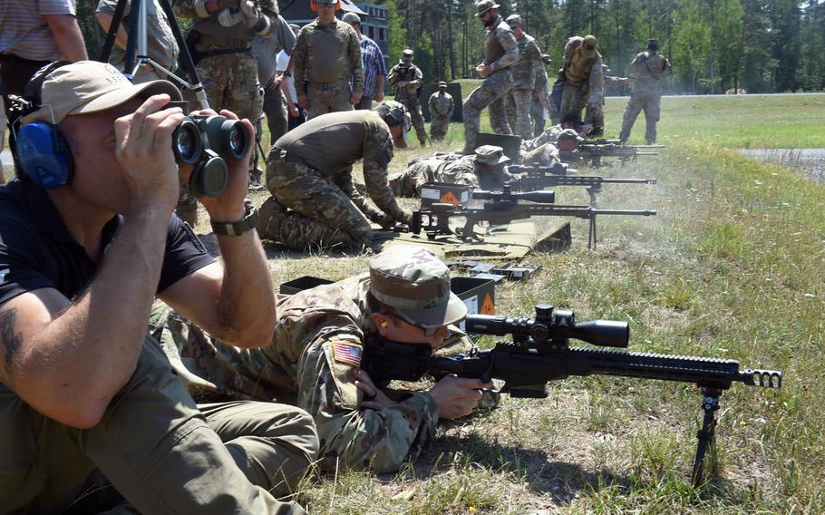 Soldiers from several countries test out different sniper rifles during one of the events at the 2019 European Best Sniper Team Competition, at Grafenwoehr, Germany, Thursday, July 25, 2019.