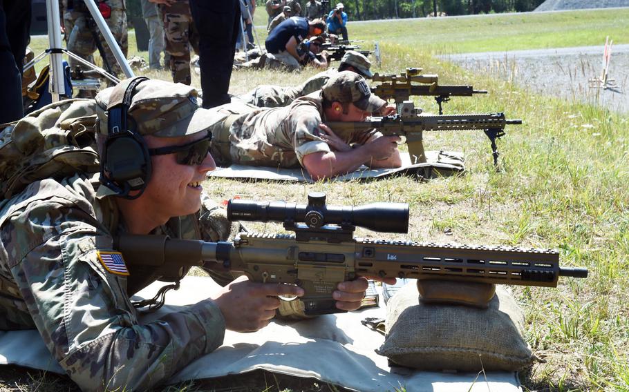 Soldiers from several countries test out different marksmanship rifles during one of the events at the 2019 European Best Sniper Team Competition, at Grafenwoehr, Germany, Thursday, July 25, 2019.