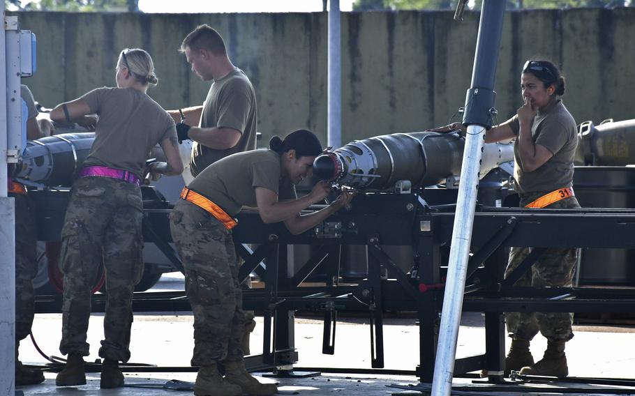 Airmen build bombs in an assembly line during the Combat Ammunition Production Exercise 2019, at Aviano Air Base, Italy, Aug. 7, 2019. The exercise tests how rapidly an Air Force wing can meet its ammunition needs in times of conflict.