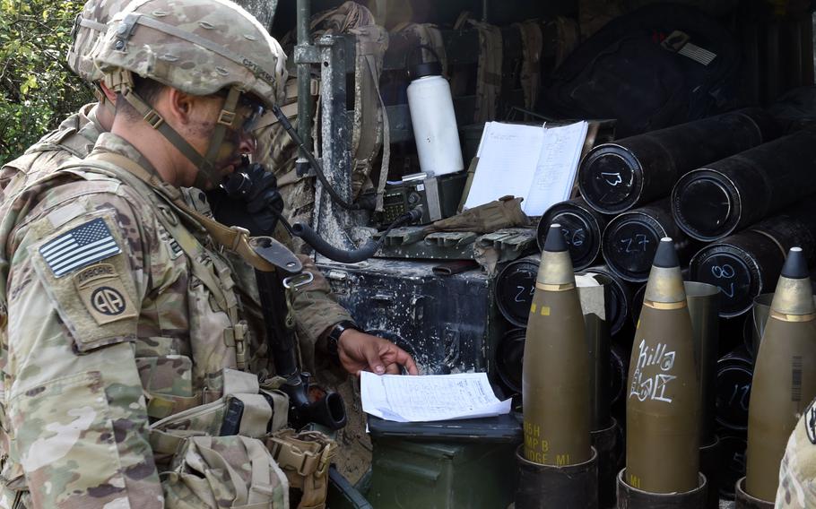 Capt. Marvin Perez-Cruz, an artillery battery commander with the 173rd Infantry Brigade Combat Team (Airborne), looks over orders during an exercise in Grafenwoehr, Germany, Aug. 13, 2019.