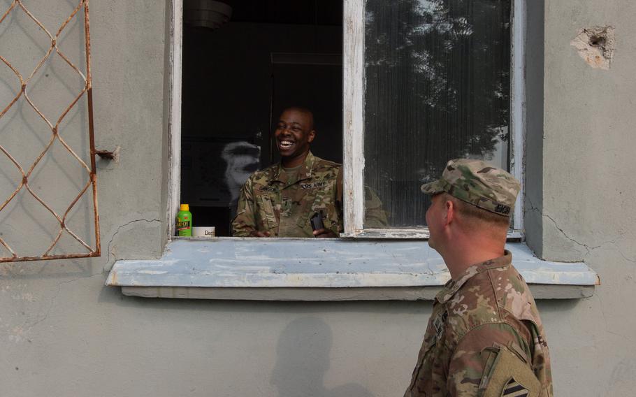 Chief Warrant Officer 2 Nelson Dawson and Chief Warrant Officer 2 Derek Eich help to run operations at the supply support activity on a military base in Powidz, Poland, Aug. 27, 2019. The SSA is a logistics hub for Europe.