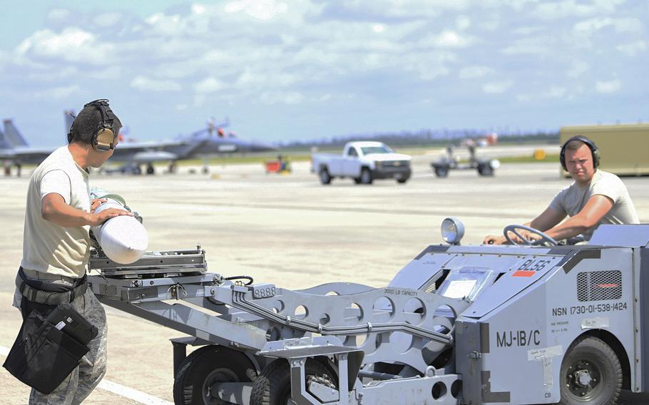 Airmen prepare to load live ammunition onto an F-15E Strike Eagle assigned to the 494th Fighter Squadron during exercise Checkered Flag at Tyndall Air Force Base, Fla., May 10, 2019.  The squadron received the Raytheon Trophy Aug. 31 in recognition of its overall performance and its Middle East deployment last year.