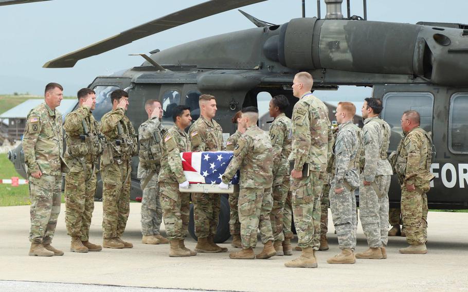 Staff Sgt. Conrad Robinson, who investigators later determined died from a heart condition, is honored with a ramp ceremony May 26, 2018, at Camp Bondsteel, Kosovo.