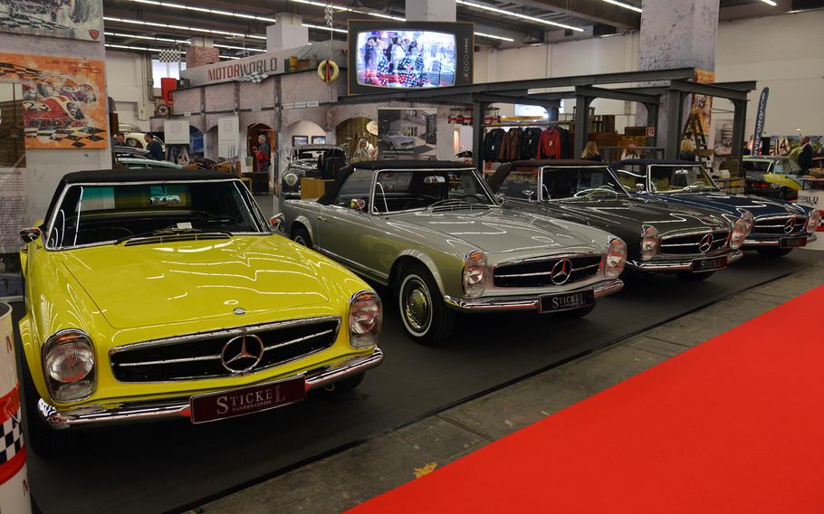 If you are tired of hybrids and electric cars, visit hall 4.0 at the IAA in Frankfurt for a look at vintage cars, like these Mercedes convertibles.