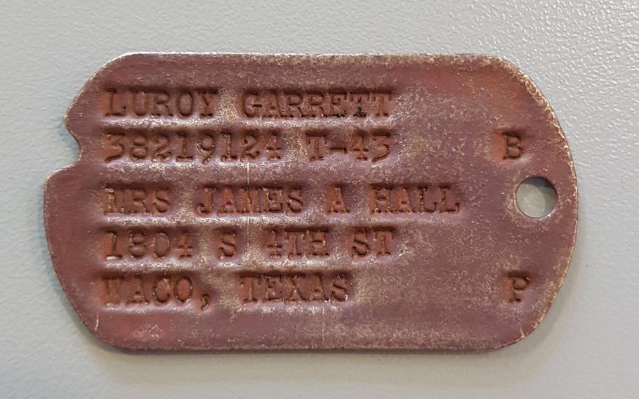 The ID tag of an American World War II soldier that Kevin Huckins found two years ago in Oxfordshire, England. Huckins is being helped by the Soldiers of Oxfordshire Museum to find relatives of the man whose name is on the tag, Luroy Garrett.