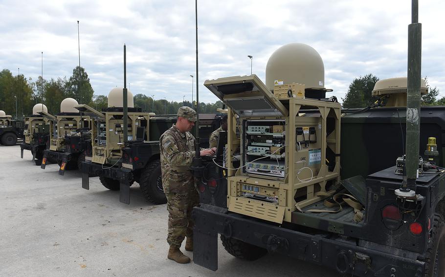 Sgt. 1st Class Clark Davis, a communications soldier with the 173rd Airborne Brigade, works with new PoP/SNE communications equipment, mounted on the back of a Humvee, during Exercise Saber Junction, Friday, Sept. 13, 2019, at Grafenwoehr, Germany. 

