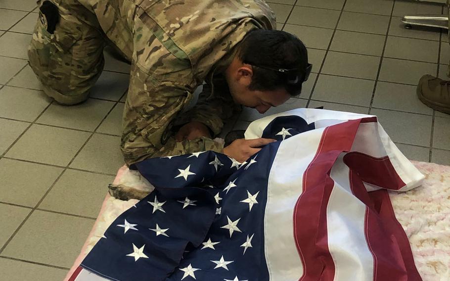 Staff Sgt. Antonio Gallegos, a military working dog handler at Ramstein Air Base, Germany, says a final good-bye to his dog, Diesel, on Friday, Sept. 20, 2019. Diesel, who was 10 years old, was one of two military working dogs from Ramstein euthanized on Friday after being diagnosed with cancer.