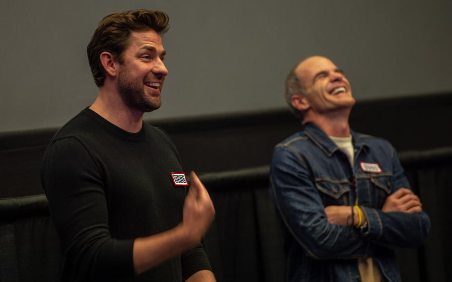 John Krasinski and Michael Kelly, from the Amazon series ''Jack Ryan,'' answer audience questions before a premiere of season two shown at the Ramstein Air Base Theater, Germany, Oct. 15, 2019.