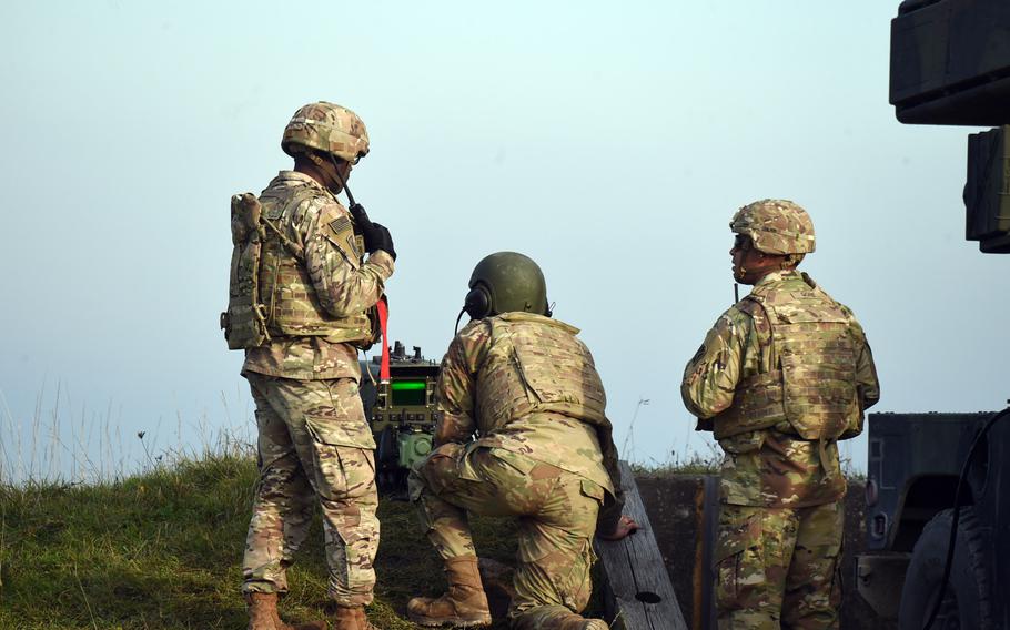 Soldiers use a remote control to fire a 50-caliber machine gun from an Avenger short-range air defense missile system at ground targets at the Grafenwoehr Training Area, Tuesday, Oct. 16, 2019.