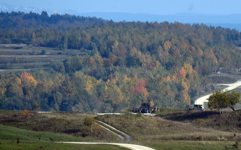 Soldiers fire a .50-caliber machine gun from an Avenger short-range air defense missile system at a drone during training at the Grafenwoehr Training Area, Tuesday, Oct. 16, 2019.