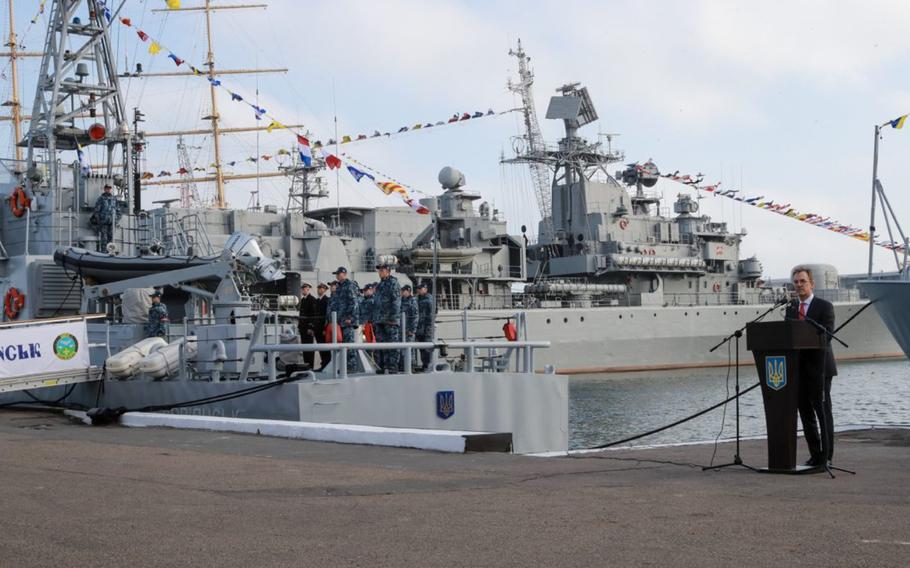 Acting U.S. ambassador to Ukraine Joseph Pennington speaks in the port of Odessa during a ceremony at which two retired U.S. Coast Guard Island-class patrol boats were officially transferred to the Ukrainian navy on Wednesday, Nov.13, 2019.