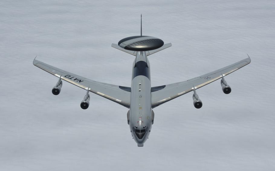 A NATO AWACS aircraft leaves formation after performing mid-air refueling training over central Europe, May 17, 2018.