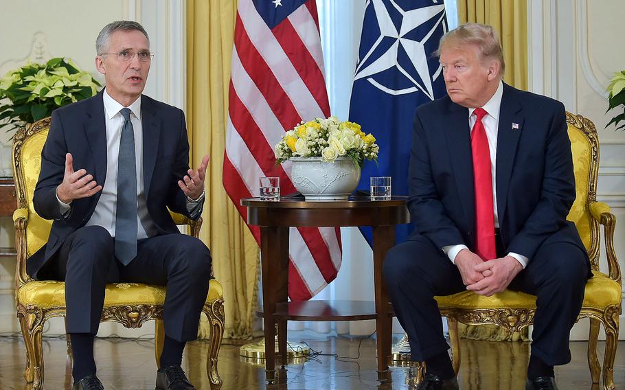 U.S. President Donald Trump listens to NATO Secretary-General Jens Stoltenberg as he answers a question following a meeting at Winfield House in London, Tuesday, Dec. 3, 2019, ahead of the NATO summit marking the alliance's 70th anniversary.