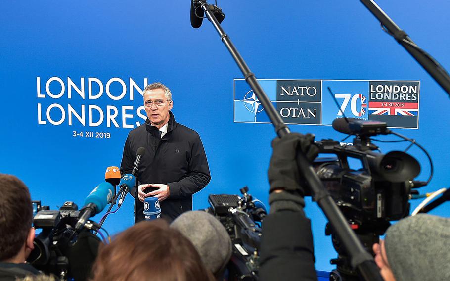 NATO Secretary-General Jens Stoltenberg talks to the media before the start of the NATO leaders meeting Wednesday, Dec. 3, 2019.