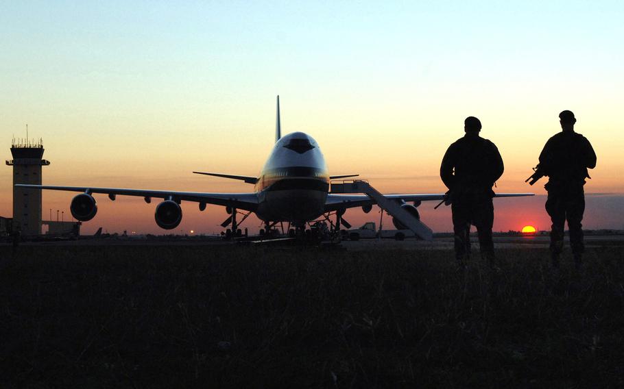 Two security forces airmen patrol the runway at Incirlik Air Base, Turkey,  in November 2015. Turkey has threatened to kick the U.S. off the base and restrict access to another if Congress imposes sanctions on Turkey for invading northern Syria.