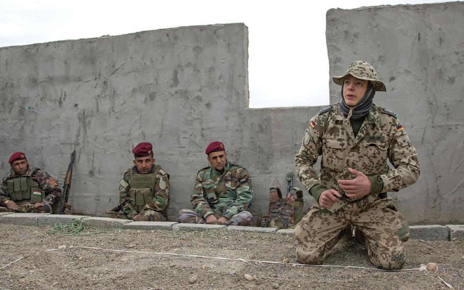 A German army trainer provides counter-improvised explosive device training in Iraq in 2017.  Some allies have begun pulling their forces out of Iraq because of security concerns in the country. Germany will send 30 of its 120 soldiers in Iraq to Jordan and Kuwait.