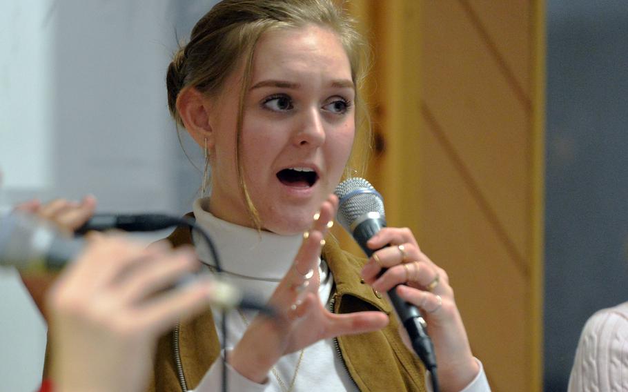 Vilseck's Erin Walden sings with the vocal jazz ensemble at this year's DODEA-Europe Jazz Festival in Kaiserslautern, Germany, Jan. 14, 2020.