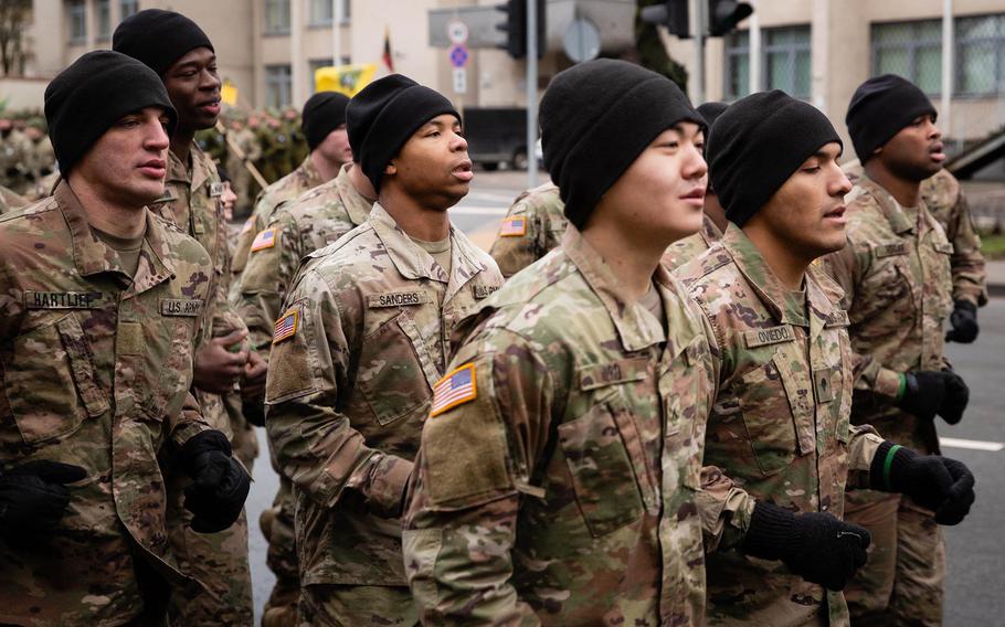 U.S. soldiers take part in the Road of Life and Death tribute run in Vilnius, Lithuania, Jan. 11, 2020. Lithuanian officials have dismissed as fake news a newspaper report that a U.S. soldier in the country has the deadly coronavirus, and the paper that published the story has said its site was hacked.