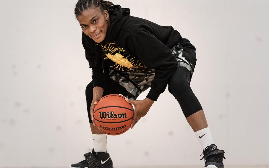 Sgt. 1st Class Lastephanie Frazier of the 509th Signal Battalion spends her time off-duty on the basketball court. She's the only American on an Italian semi-professional team based in Padua. 