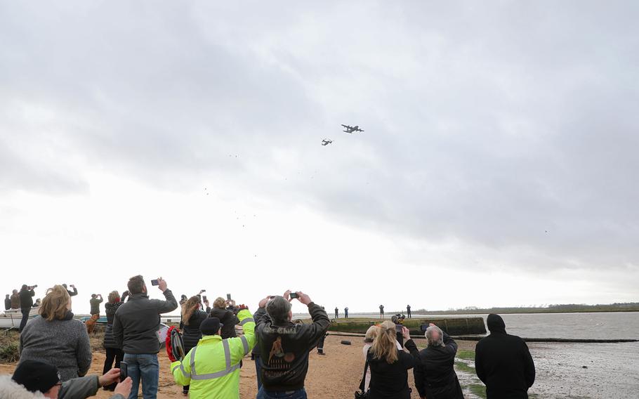 A U.S. Air Force C-130 and CV-22 from RAF Mildenhall fly over the Deben River in England on Thursday, Feb. 20, 2020, 75 years to the day that an American B-17 Flying Fortress crashed there, killing eight of the 10 crew on board.