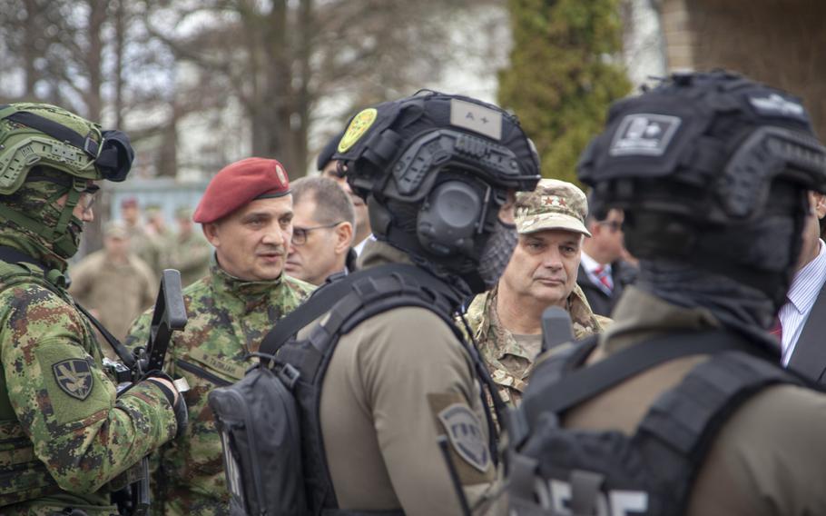 Maj. Gen. Kirk Smith, head of U.S. Special Operations Command Europe, center right, inspects a line of Serbian security forces and Navy SEALs during a counterterrorism training mission in Belgrade, Serbia, that ended Feb. 28, 2020.