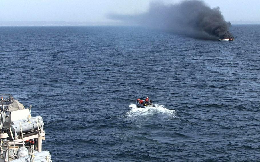 The destroyer USS Ross conducts search and rescue operations in response to a disaster at sea in the Sea of Marmara, offshore of Turkey.