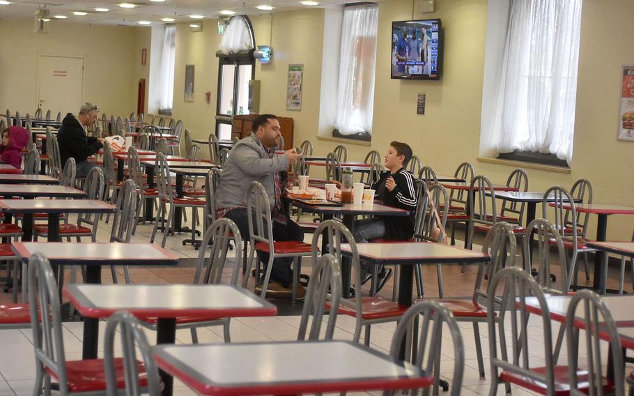 Gaps between tables at the food court are wider at Aviano Air Base, Italy, on Friday, March 6, 2020. Tables were pushed apart to meet a directive placing 1 meter between people in public places, in order to combat the spread of the coronavirus.