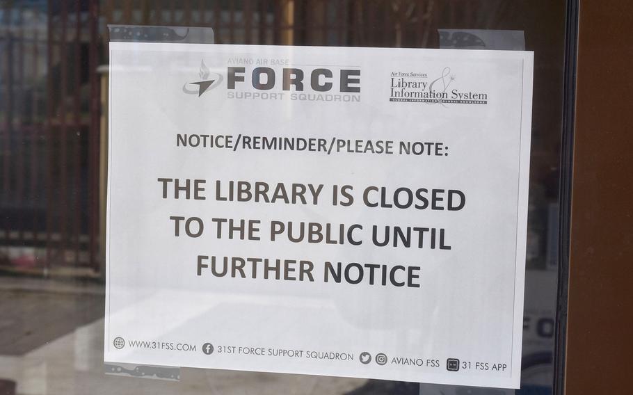 A sign on the door of the library on Aviano Air Base in Italy says it's closed. The closure is in line with an Italian decree mandating that public facilities across the country shut their doors as part of efforts to halt the spread of the coronavirus.