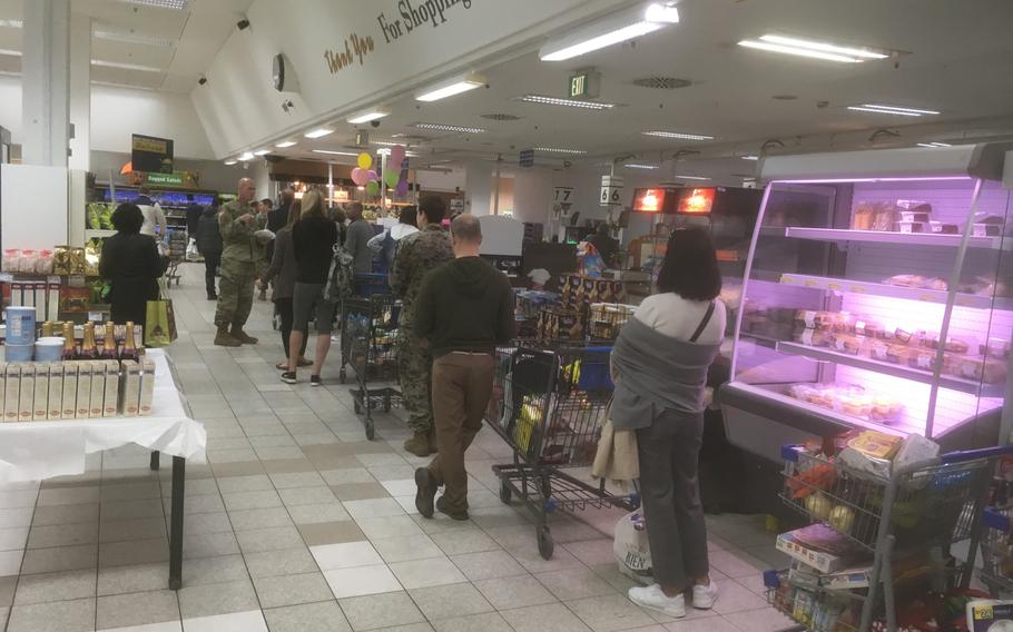 At the Patch Barracks commissary in Stuttgart, shelves are well stocked with supplies Wednesday, March 18, 2020, but some customers appear to be ignoring social distancing rules, which call for people to stand at least one meter away from each other to try to stem the spread of the coronavirus.