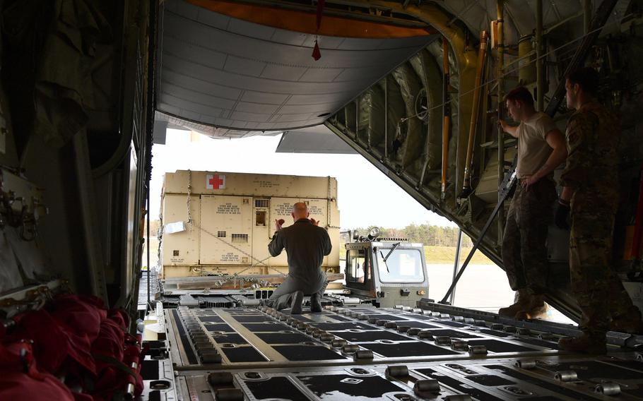 Airmen assigned to the 721st Aerial Port Squadron load pallets of medical supplies onto a C-130J Super Hercules aircraft heading to Aviano Air Base, Italy, at Ramstein Air Base, Germany, March 20, 2020. The supplies were sent in an effort to provide medical support to Italy amid the coronavirus pandemic.