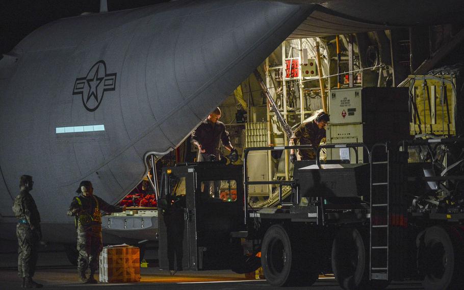 A C-130 Hercules stationed out of Ramstein Air Base, Germany, delivers pallets of medical equipment to Aviano Air Base, Italy, March 20, 2020.