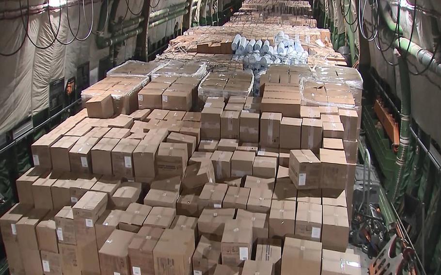 Boxes with medical masks and equipment onboard a Russian plane at Chkalovsky Airport, near Moscow, in an undated photo. Russia says it has sent coronavirus medical supplies to the United States.