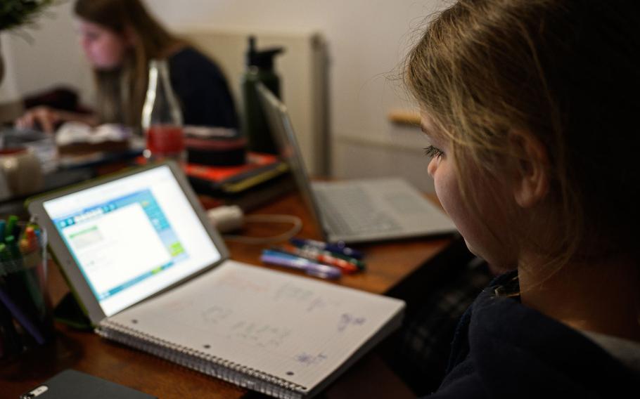 Kendal Morgenweck, a fifth grader at Hohenfels Elementary School, does her daily online assignments from home, March 26, 2020, at Hohenfels Training Area. Some DODEA schools in Europe are adjusting their digital learning schedules to accommodate families with more than one school-age child and to reduce time online and workload for some students.