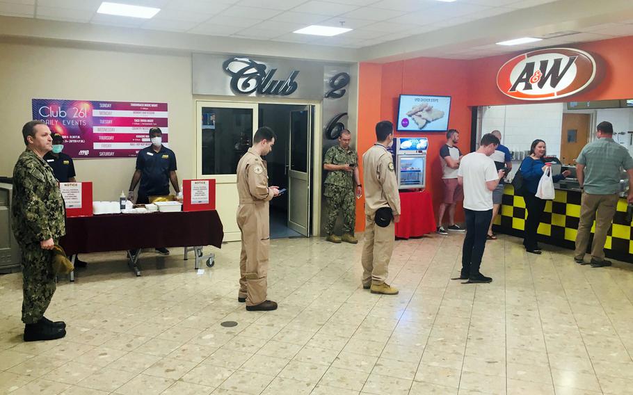 Customers practice social distancing at Naval Support Activity Bahrain, March 25, 2020.