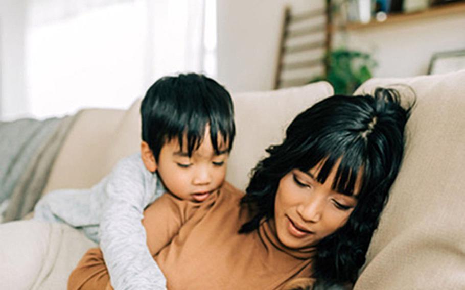 Deanna Sonza spends time with her kids in their home in Rothenstadt, Germany, in December. The Sonzas shipped out their household goods shortly before a 60-day stop-movement put moving to their next duty station on hold, but said they've received help from friends and neighbors.